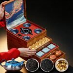 Premium Black Tea Gift Set with Teapot & Cups — Chinese Jin Jun Mei Loose Leaf Tea, Pu'er Tuocha & Rougui, Luxury Wood-Grain Phoenix Gift Box - Image 2