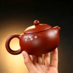 Fully Handmade Yixing Zisha Teapot — Raw Da Hong Pao Red Clay, Classic Xishi Shape with Hand-Painted Plum Blossom, Ball-Hole Strainer, 260ml - Image 14