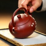 Fully Handmade Yixing Zisha Teapot — Raw Da Hong Pao Red Clay, Classic Xishi Shape with Hand-Painted Plum Blossom, Ball-Hole Strainer, 260ml - Image 3